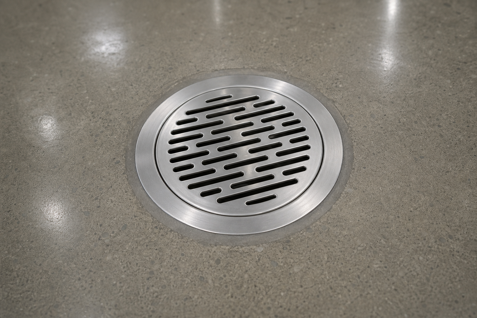 Circular stainless floor drain in a commercial facility